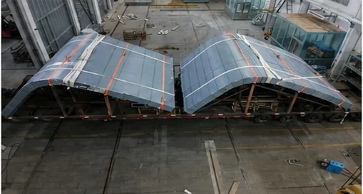Curved acrylic assembly during fabrication for the Tongxiang project